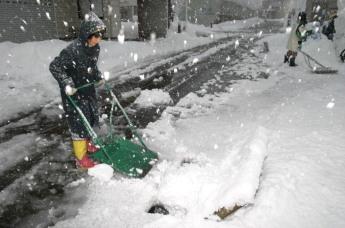 流雪こうに雪を運んでいる様子の写真